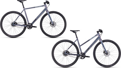 Twee Cube Hyde Racefietsen, één met een diamant frame en één met een trapeziumvormig frame.